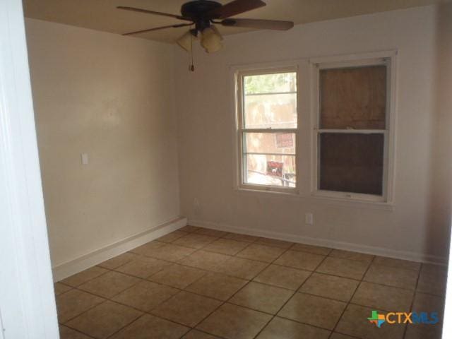 335 Hot Wells Blvd, San Antonio, TX 78223 - empty room with a ceiling fan and baseboards