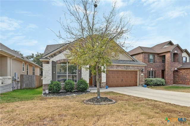 view of front of house featuring a front lawn and a garage