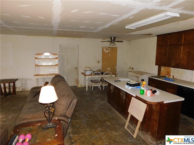 kitchen featuring a kitchen island and ceiling fan