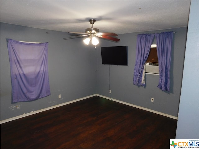 unfurnished room featuring hardwood / wood-style flooring, ceiling fan, a textured ceiling, and cooling unit