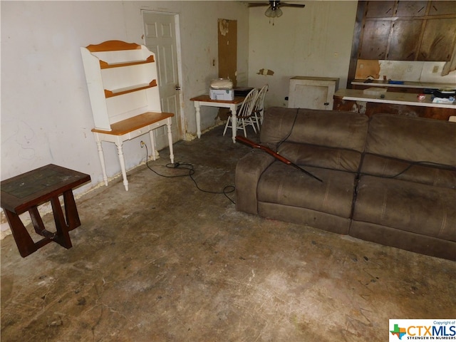 living room with concrete flooring and ceiling fan