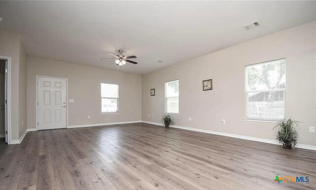 2703 Cardinal St, Victoria, TX 77901 - empty room featuring a ceiling fan and wood finished floors