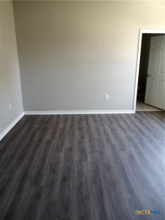2703 Cardinal St, Victoria, TX 77901 - unfurnished room with dark wood finished floors