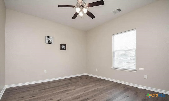 2703 Cardinal St, Victoria, TX 77901 - unfurnished room with dark wood-style flooring and ceiling fan
