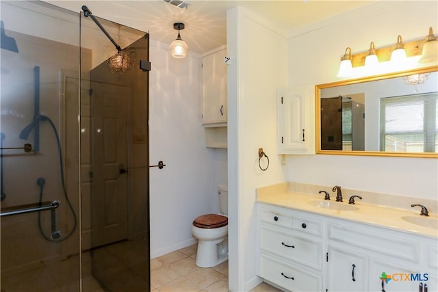 full bathroom with a shower stall, toilet, double vanity, tile patterned floors, and baseboards