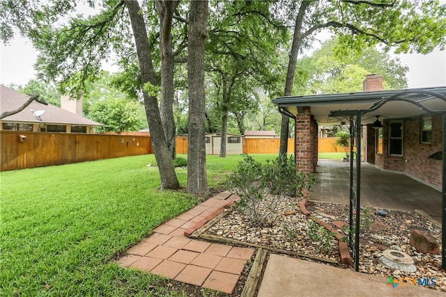 view of yard featuring a patio