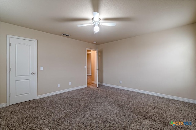 empty room with carpet floors and ceiling fan