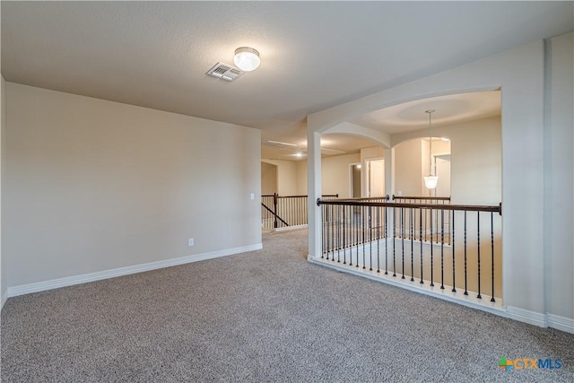 spare room with carpet floors