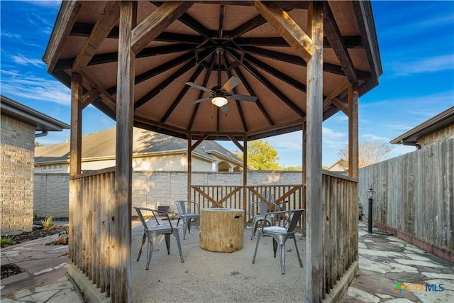 view of patio / terrace with a gazebo and ceiling fan