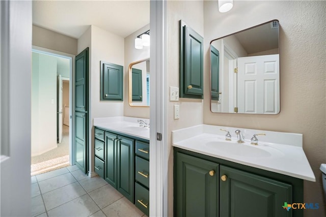 bathroom with vanity and tile patterned flooring