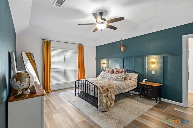 701 W Esparada Dr, Georgetown, TX 78628 - bedroom featuring wood finished floors, baseboards, and a ceiling fan