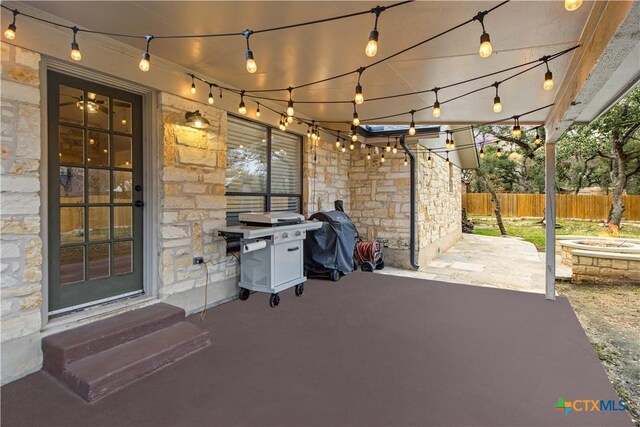 701 W Esparada Dr, Georgetown, TX 78628 - view of patio with fence, entry steps, and area for grilling