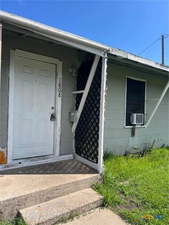 entrance to property with cooling unit