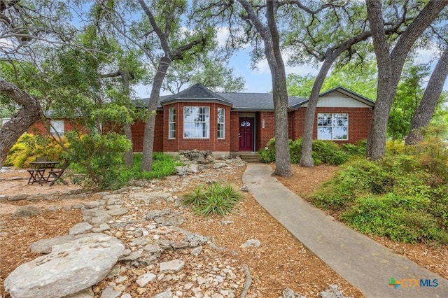 2111 Quail Run, San Marcos, TX 78666 - view of front facade featuring brick siding