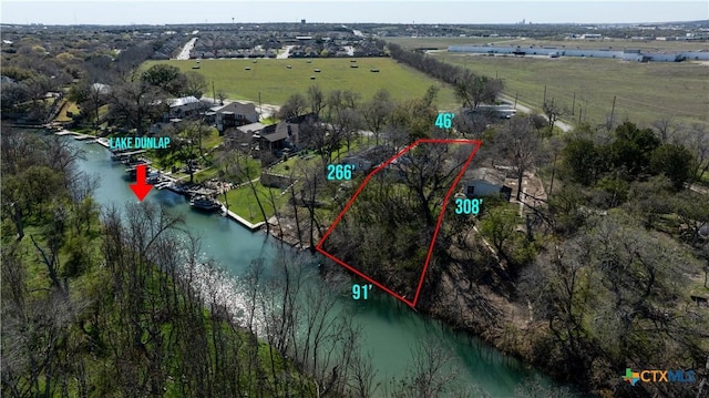 2021 Chinaberry Ln, New Braunfels, TX 78130 - overview of rural landscape featuring a nearby body of water and property boundaries highlighted