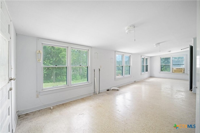 2021 Chinaberry Ln, New Braunfels, TX 78130 - empty room featuring plenty of natural light and cooling unit