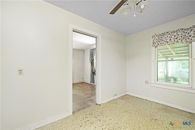 2021 Chinaberry Ln, New Braunfels, TX 78130 - unfurnished room featuring baseboards and a ceiling fan