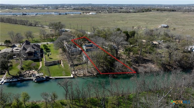2021 Chinaberry Ln, New Braunfels, TX 78130 - view of rural area featuring property parcel outlined and a nearby body of water