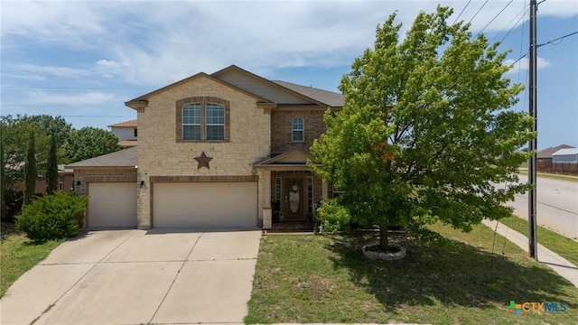 2307 Scott Dr, Copperas Cove, TX 76522 - traditional home featuring brick siding, driveway, a garage, stone siding, and a front lawn