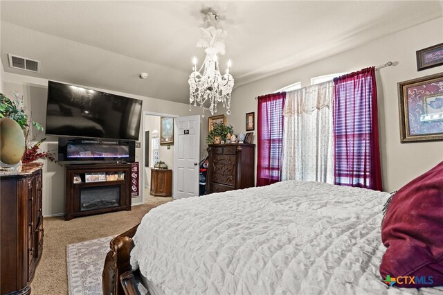 2307 Scott Dr, Copperas Cove, TX 76522 - bedroom with carpet floors and a chandelier