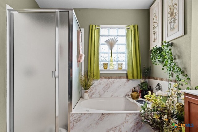 2307 Scott Dr, Copperas Cove, TX 76522 - full bath with a stall shower, vanity, and a garden tub