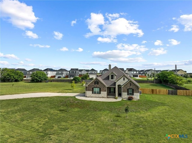 200 Tate Ln, Round Rock, TX 78626 - french country inspired facade featuring a residential view, a chimney, and brick siding