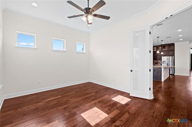200 Tate Ln, Round Rock, TX 78626 - empty room featuring ceiling fan, crown molding, dark wood-type flooring, and recessed lighting