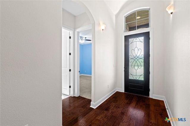200 Tate Ln, Round Rock, TX 78626 - entryway with arched walkways and dark wood finished floors