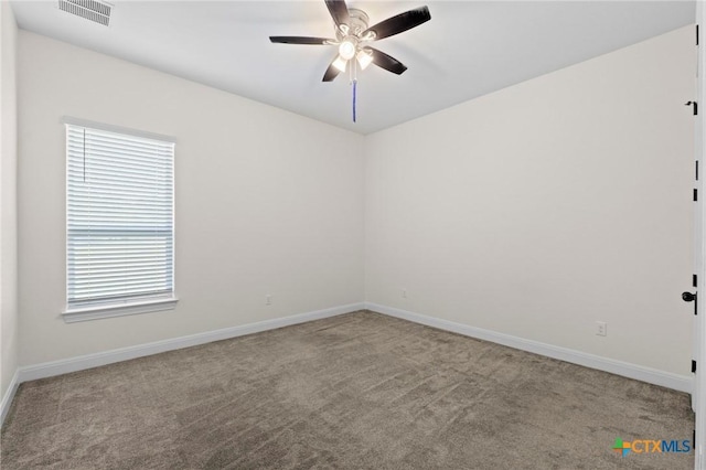 200 Tate Ln, Round Rock, TX 78626 - empty room featuring carpet floors and a ceiling fan
