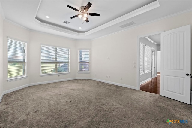 200 Tate Ln, Round Rock, TX 78626 - spare room featuring crown molding, a tray ceiling, carpet, ceiling fan, and recessed lighting
