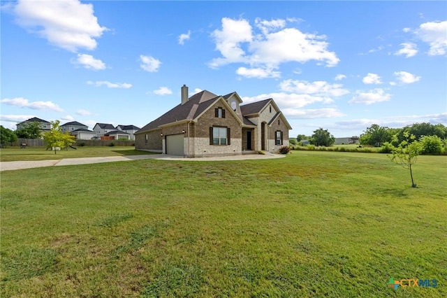 200 Tate Ln, Round Rock, TX 78626 - view of front facade with driveway, brick siding, a chimney, and a front lawn