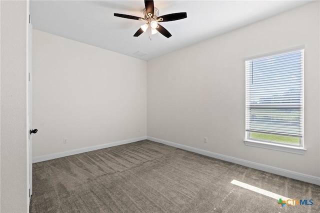 200 Tate Ln, Round Rock, TX 78626 - empty room featuring carpet and ceiling fan