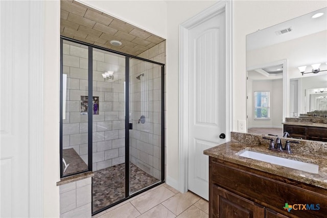 200 Tate Ln, Round Rock, TX 78626 - bathroom with a stall shower, vanity, and tile patterned floors