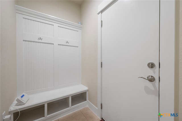 14000 Alloro Dr, Austin, TX 78717 - mudroom with light tile patterned floors and baseboards