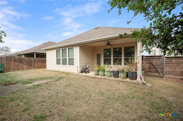 14000 Alloro Dr, Austin, TX 78717 - rear view of house featuring a fenced backyard, a ceiling fan, and a lawn