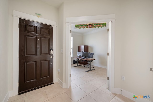 14000 Alloro Dr, Austin, TX 78717 - entryway with light tile patterned floors, baseboards, and ornamental molding