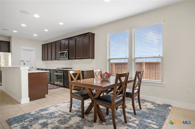 14000 Alloro Dr, Austin, TX 78717 - dining area with light tile patterned floors, baseboards, and recessed lighting
