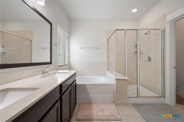14000 Alloro Dr, Austin, TX 78717 - full bath featuring a bath, tile patterned flooring, a sink, a stall shower, and double vanity
