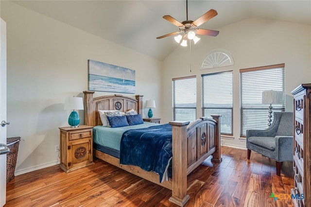 bedroom with vaulted ceiling, dark hardwood / wood-style floors, and ceiling fan