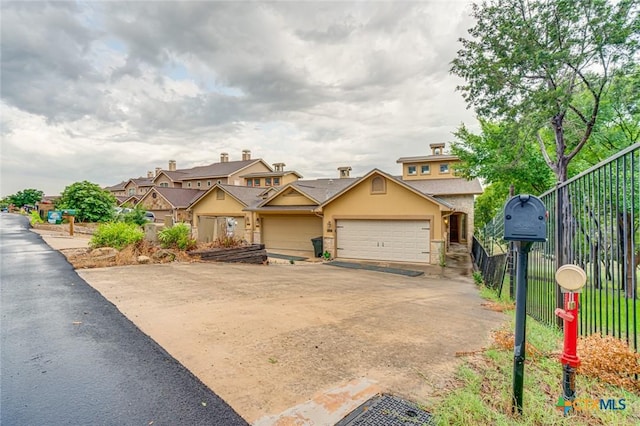 view of front of home with a garage