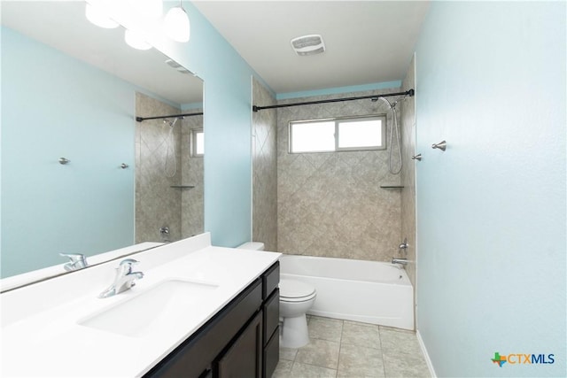 bathroom featuring vanity, toilet, visible vents, bathtub / shower combination, and tile patterned flooring
