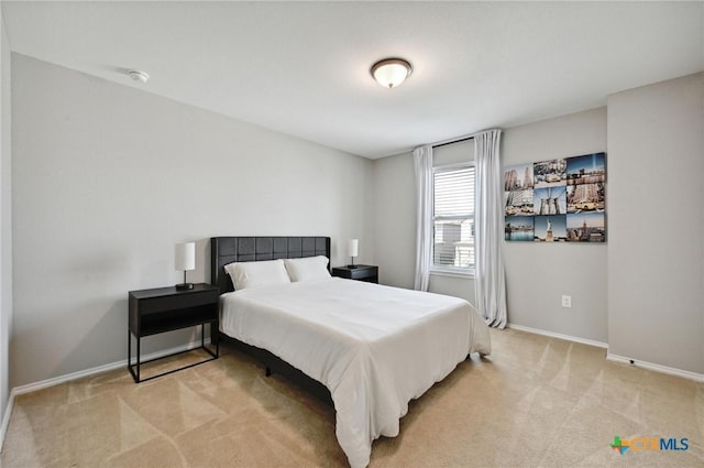 6309 Carriage Pines Dr, Del Valle, TX 78617 - bedroom with light colored carpet and baseboards