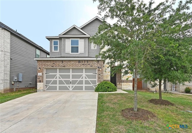 6309 Carriage Pines Dr, Del Valle, TX 78617 - craftsman house with fence, a front yard, concrete driveway, and an attached garage