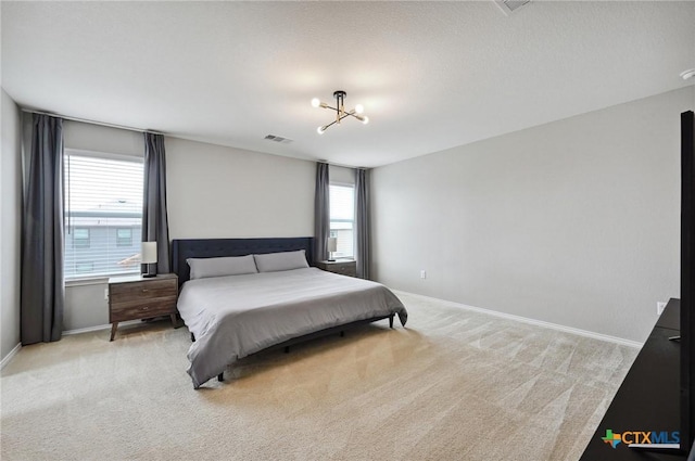 6309 Carriage Pines Dr, Del Valle, TX 78617 - bedroom with visible vents, baseboards, and carpet floors