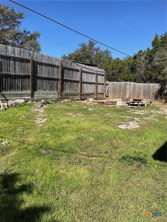 2413 Fuller Dr, Canyon Lake, TX 78133 - view of fenced backyard