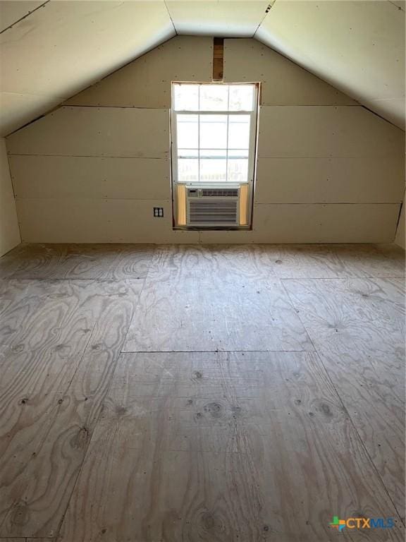 2413 Fuller Dr, Canyon Lake, TX 78133 - additional living space featuring vaulted ceiling and cooling unit