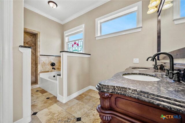 34 Spruce Dr, Belton, TX 76513 - bathroom with ornamental molding, a bath, vanity, and baseboards