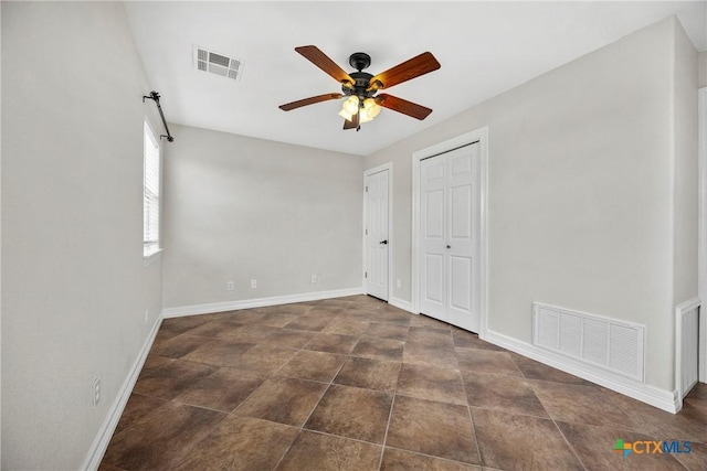 34 Spruce Dr, Belton, TX 76513 - unfurnished bedroom with baseboards and ceiling fan