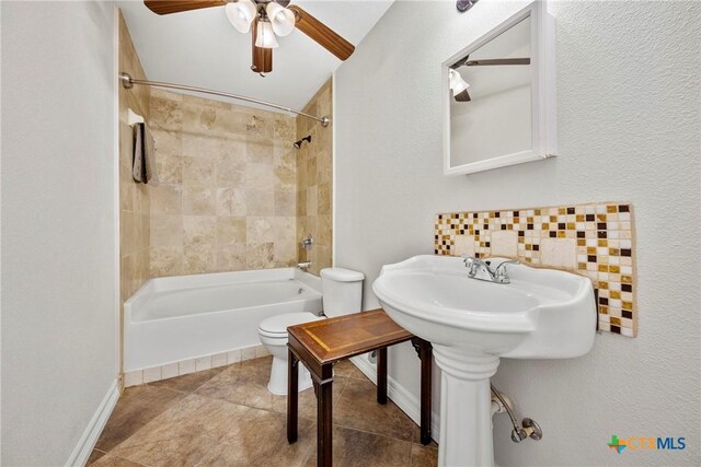 34 Spruce Dr, Belton, TX 76513 - bathroom with toilet, a ceiling fan, shower / tub combination, and baseboards