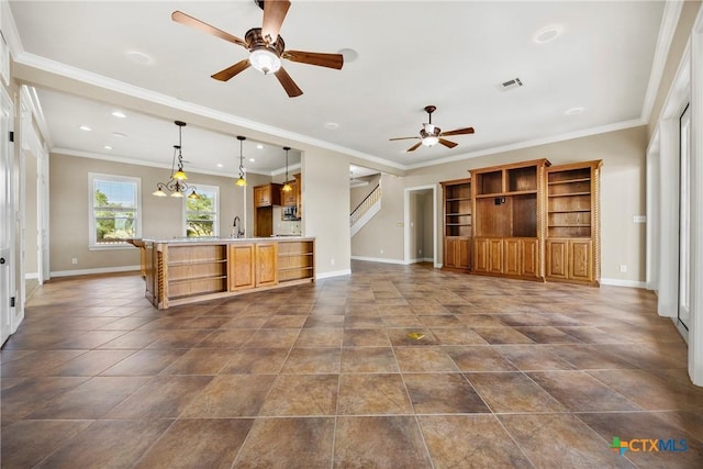 34 Spruce Dr, Belton, TX 76513 - unfurnished living room with ceiling fan, baseboards, crown molding, and recessed lighting